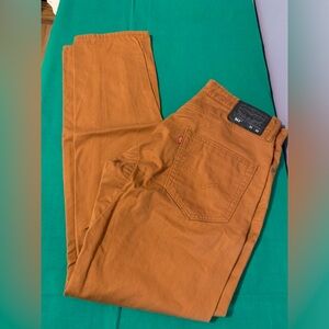 Levi’s 511 tan/orange jeans W31 L32